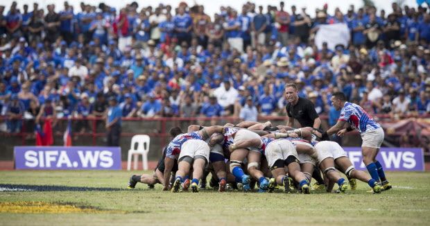 New Zealand All Blacks and Samoa form a scrum during their match at Apia Park in Apia, Samoa, Wednesday, July 8, 2015. New Zealand won the match 25-16 in the All Blacks' first-ever test match in the Pacific Island nation. (Dean Purcell/New Zealand Herald via AP) NEW ZEALAND OUT, AUSTRALIA OUT