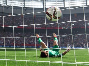 Japan goalkeeper Ayumi Kaihori allows a third goal to United States' Carli Lloyd during first half FIFA Women's World Cup final soccer action in Vancouver on Sunday.