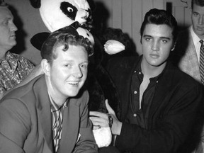 Elvis Presley with Vancouver disc jockey Red Robinson before his concert at Empire Stadium on Aug. 31, 1957.