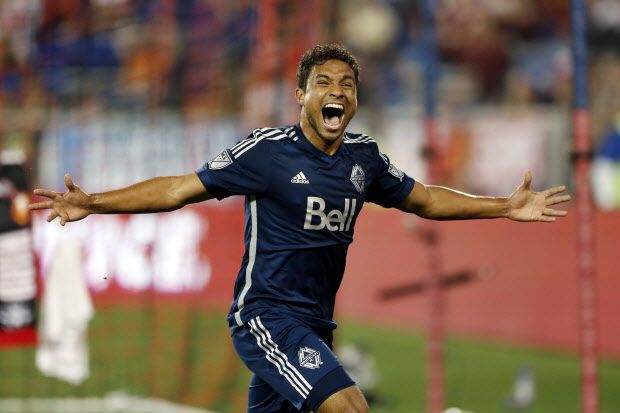 Vancouver Whitecaps FC midfielder Kianz Froese celebrates after scoring a goal against the New York Red Bulls during the second half of an MLS soccer match, Saturday, June 20, 2015, in Harrison, N.J. The Whitecaps won 2-1. (AP Photo/Julio Cortez)