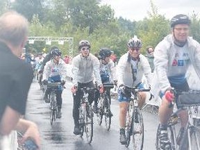 Cyclists Set Out In Full Rain Gear Today