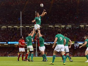 Welsh and Irish players vie for the ball in the line out during the 2015 Rugby World Cup warm up rugby union match between Wales and Ireland at The Millennium Stadium in Cardiff, south Wales on August 8, 2015. The 2015 Rugby World Cup begins on September 18, 2015, and will be held at various venues across England and Wales. Ireland won the game 35-21. GEOFF CADDICK/AFP/Getty Images