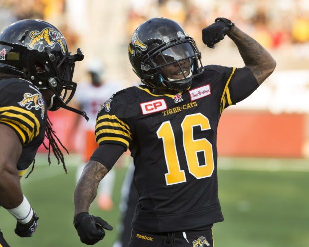 Hamilton Tiger-Cats' Brandon Banks (16) celebrates after the first touchdown of the game against the B.C. Lions during the first half of CFL football action in Hamilton on Saturday, August 15, 2015. THE CANADIAN PRESS/Peter Power