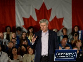 Conservative Leader Stephen Harper takes part in a rally in Richmond, B.C. on Tuesday, August 11, 2015. THE CANADIAN PRESS/Sean Kilpatrick