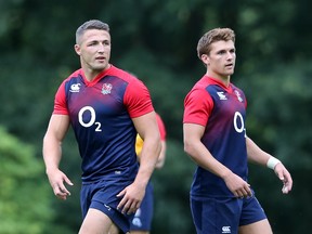Sam Burgess (left) and Henry Slade, who have been selected as centres for England in the match against France on Saturday, in England's training session held at Pennyhill Park on August 10, 2015 in Bagshot, England.  (Photo by David Rogers/Getty Images)