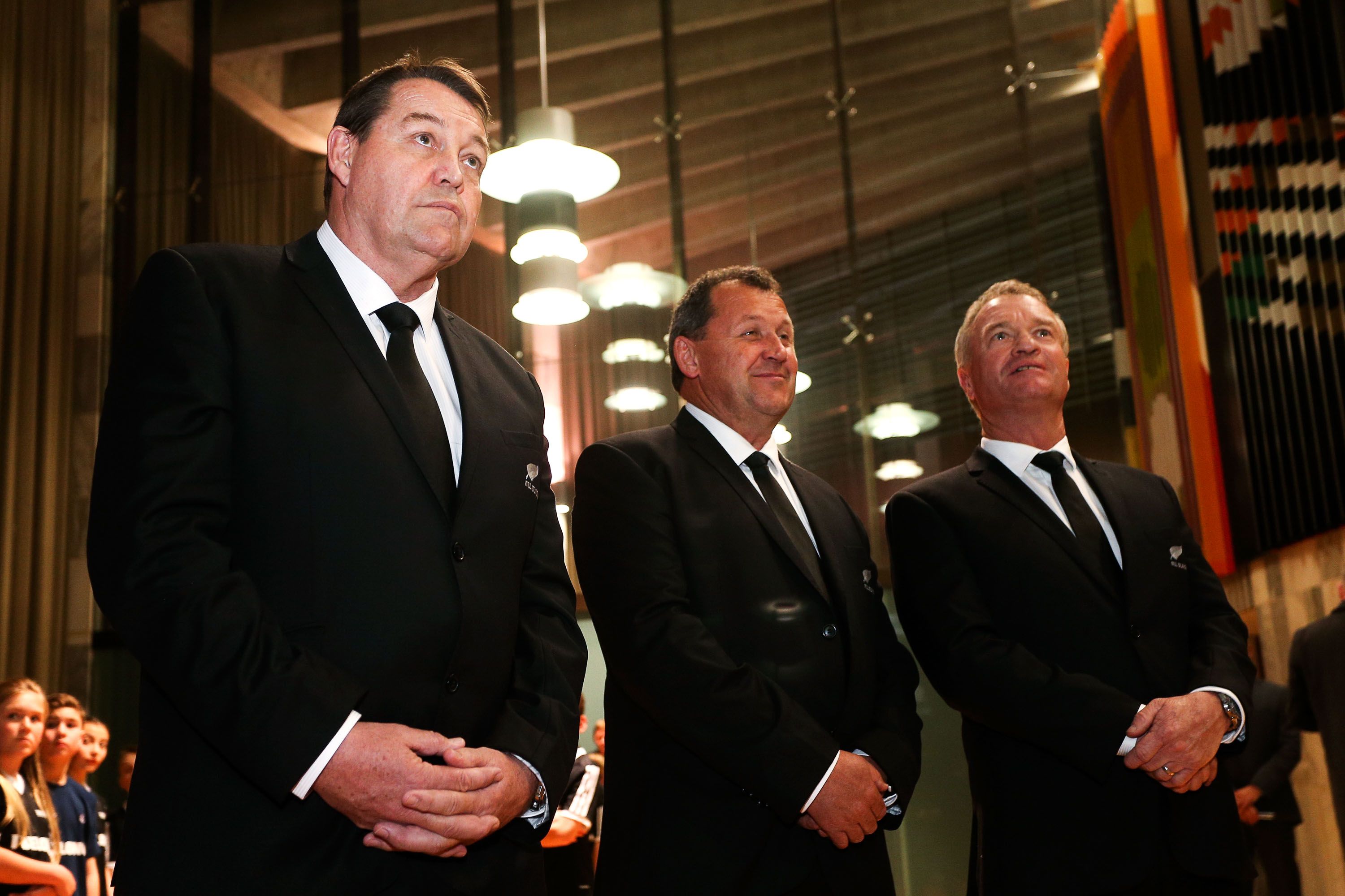 WELLINGTON, NEW ZEALAND - AUGUST 30:  L to R, Coach Steve Hansen, assistant coach Ian Foster and selector Grant Fox look on during the New Zealand All Blacks Rugby World Cup team announcement at Parliament House on August 30, 2015 in Wellington, New Zealand.  (Photo by Hagen Hopkins/Getty Images)