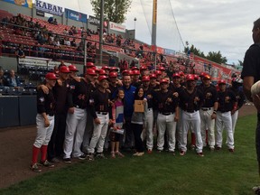 The Vancouver Canadians honoured play-by-play man Rob Fai (smiling fella in the middle) and longtime newspaper reporter Grant Kerr with spots in their media hall of fame Saturday night. (Photo courtesy of Dixon Tam.)