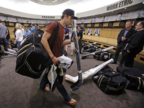 Brandon Sutter packs up his things following the 2014 playoffs in Pittsburgh.