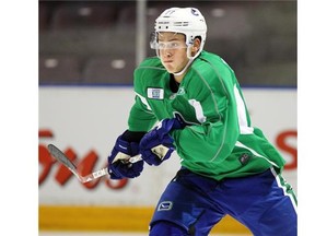 Jake Virtanen gets a turn alongside Henrik and Daniel Sedin for the Canucks against the Coyotes. (Province Files.)