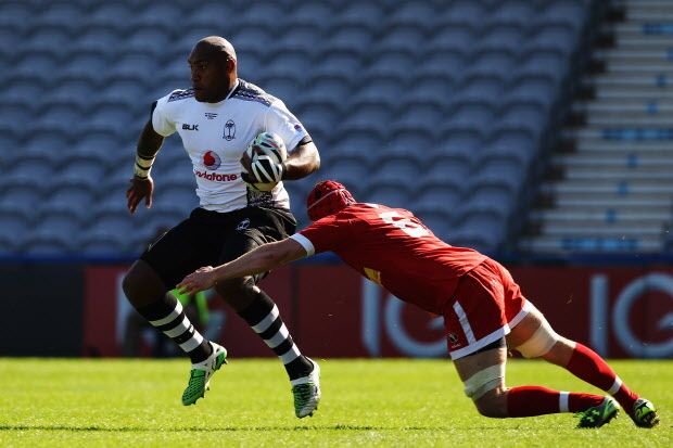 LONDON, ENGLAND - SEPTEMBER 06:  Nemani Nadolo of Fiji evades the challenge of Kyle Gilmour of Canada during the pre-Rugby World Cup International Friendly match between Fiji and Canada at Twickenham Stoop on September 6, 2015 in London, England.  (Photo by Ker Robertson/Getty Images)