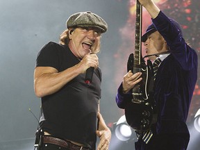 Singer Brian Johnson and guitarist Angus Young of AC/DC perform in Montreal. They'll be in Vancouver on Tuesday night.