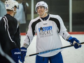 Alex Burrows and Daniel Sedin took to the ice Tuesday at Britannia rink in East Vancouver. Watch for Ben Kuzma's story on Burrows later today. Photo by Arlen Redekop/PNG.