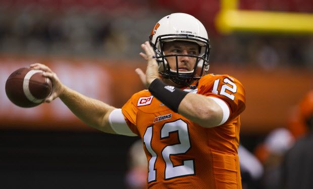 VANCOUVER   July 24 2015. BC Lions #12 John Beck throws in the pre game warm up prior to playing the Toronto Argonauts in a regular season CFL football game at BC Place, Vancouver July 24 2015.  Gerry Kahrmann  /  PNG staff photo) ( For Prov / Sun Sports)   00038106A [PNG Merlin Archive]