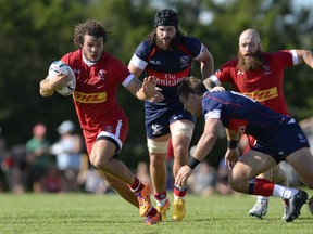 Taylor Paris put in a strong performance before being forced from the field by a last minute knee injury in Canada's 42-23 loss to the USA. THE CANADIAN PRESS/Justin Tang