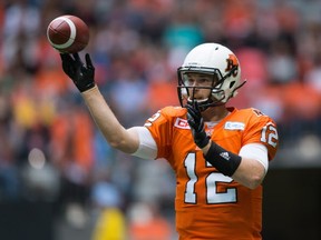 B.C. Lions' John Beck passes against the Ottawa Redblacks during the first half of a CFL football game in Vancouver, B.C., on Sunday September 13, 2015. THE CANADIAN PRESS/Darryl Dyck