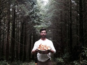Chris with foraged mushrooms