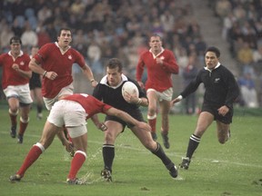 20 Oct 1991: Craig Innes of New Zealand tries to charge through the Canadian defence during the Rugby World Cup quarter-final match in Lille, France. New Zealand beat Canada 29-13.  Dan  Smith/Allsport/Getty Images
