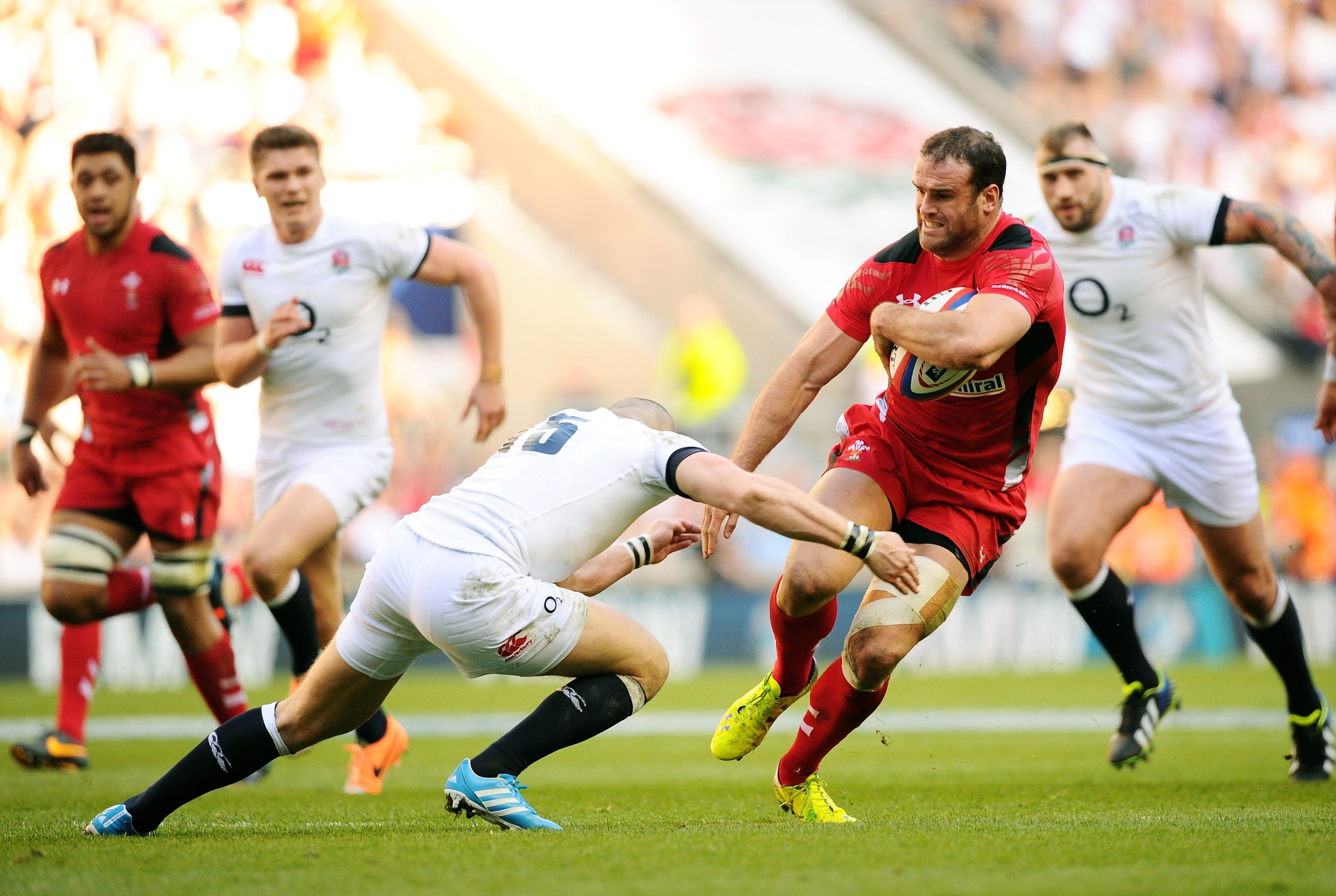 LONDON, ENGLAND - MARCH 09:  Jamie Roberts of Wales is tackled by Mike Brown of England during the RBS Six Nations match between England and Wales at Twickenham Stadium on March 9, 2014 in London, England.  (Photo by Mike Hewitt/Getty Images)