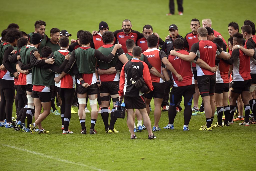 Japan's players gather together during the captain's run training session at Brighton Community Stadium on September 18, 2015, ahead of the 2015 Rugby Union World Cup. Japan will face South Africa on Saturday. AFP PHOTO / LIONEL BONAVENTURE RESTRICTED FOR EDITORIAL USE        (Photo credit should read LIONEL BONAVENTURE/AFP/Getty Images)