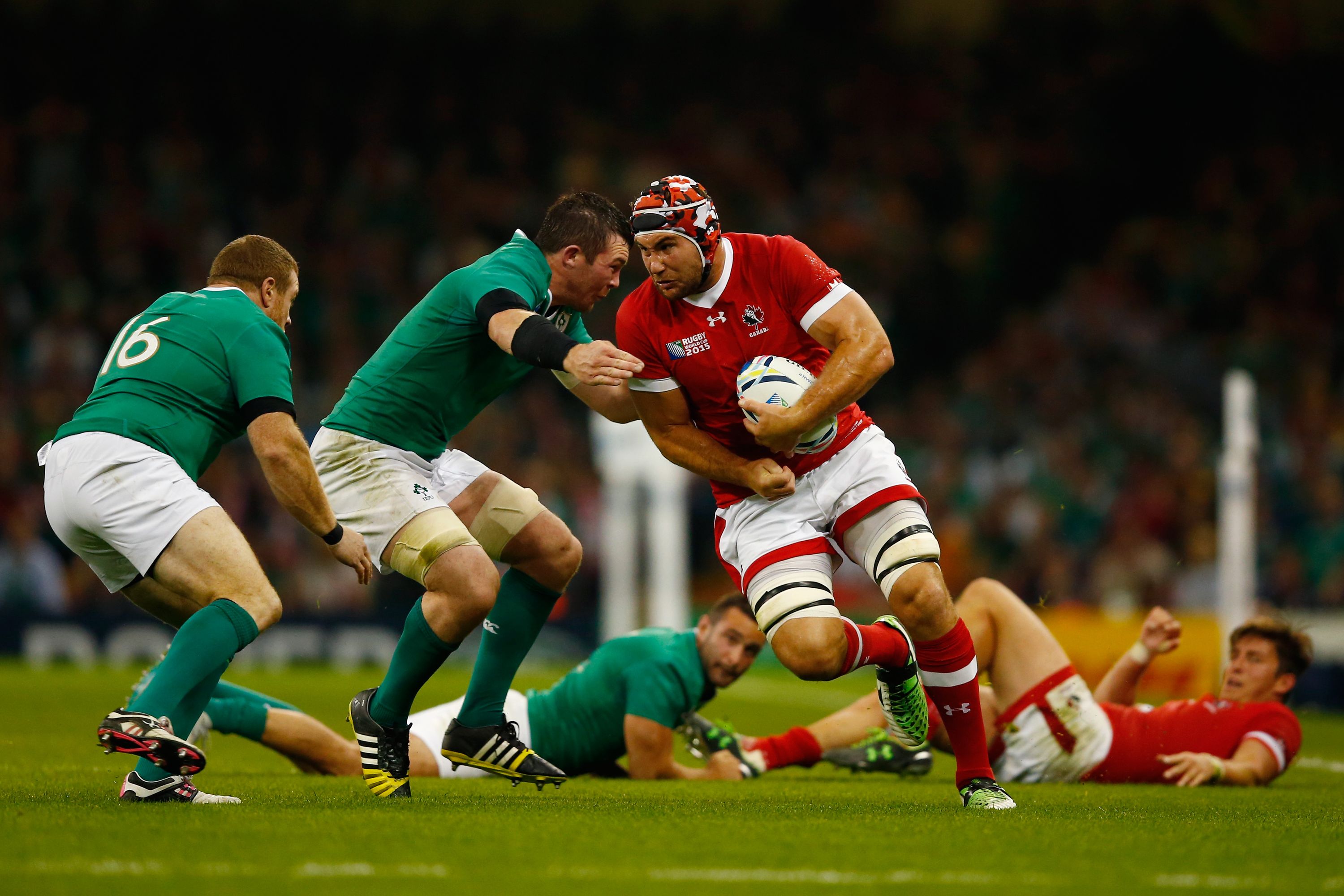 CARDIFF, WALES - SEPTEMBER 19:  Jebb Sinclair of Canada takes on the Ireland defence during the 2015 Rugby World Cup Pool D match between Ireland and Canada at the Millennium Stadium on September 19, 2015 in Cardiff, United Kingdom.  (Photo by Laurence Griffiths/Getty Images)