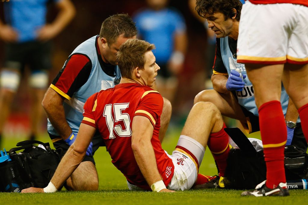 CARDIFF, WALES - SEPTEMBER 20:  Liam Williams of Wales receives treatment on his injury during the 2015 Rugby World Cup Pool A match between Wales and Uruguay at Millennium Stadium on September 20, 2015 in Cardiff, United Kingdom.  (Photo by Laurence Griffiths/Getty Images)