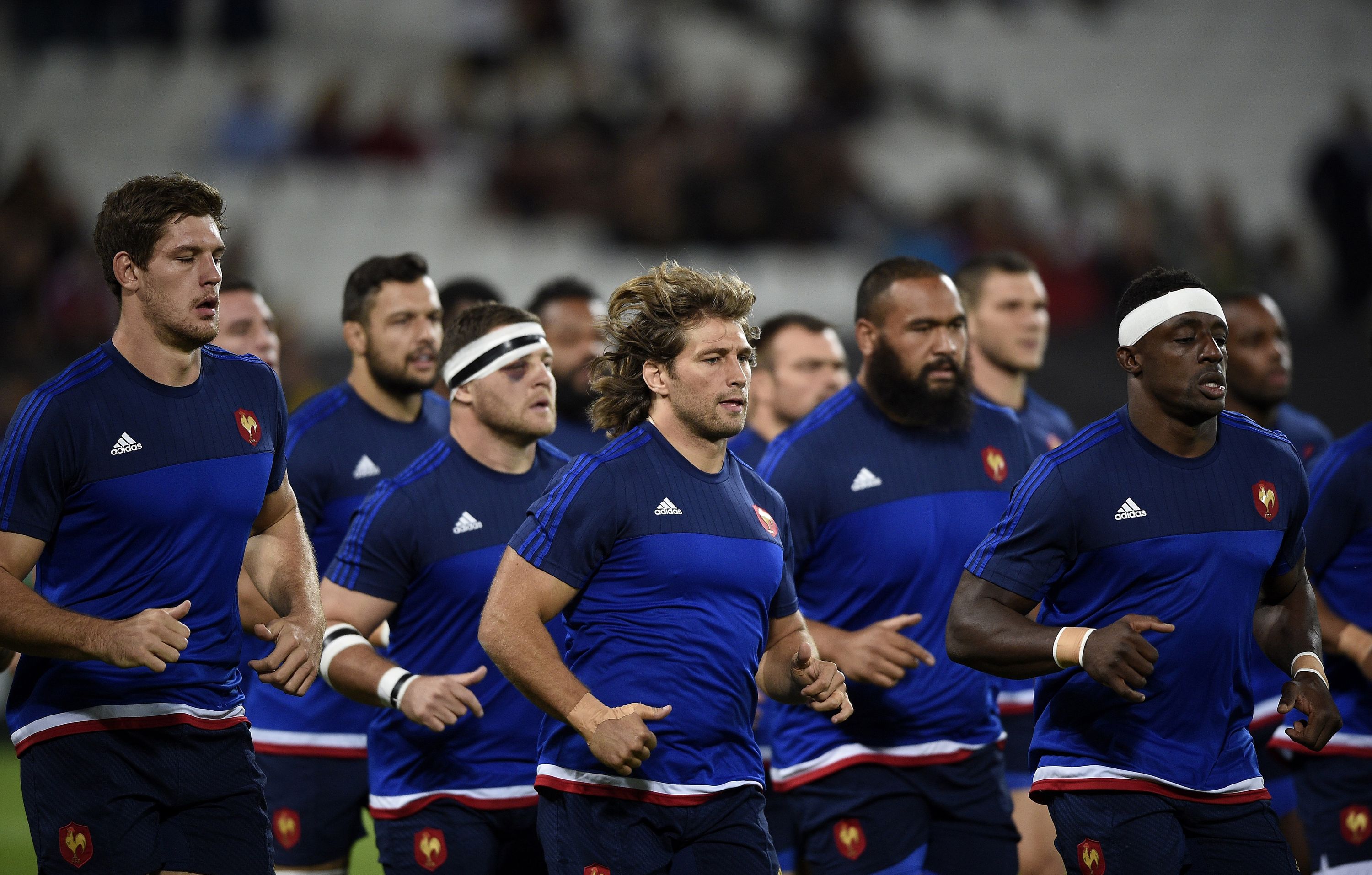 France's players warm up  prior to a Pool D match of the 2015 Rugby World Cup between France and Romania at the Olympic stadium, east London, on September 23, 2015.  AFP PHOTO / FRANCK FIFE RESTRICTED TO EDITORIAL USE, NO USE IN LIVE MATCH TRACKING SERVICES, TO BE USED AS NON-SEQUENTIAL STILLS        (Photo credit should read FRANCK FIFE/AFP/Getty Images)