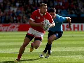 Phil Mackenzie in action against Italy at the 2015 Rugby World Cup.