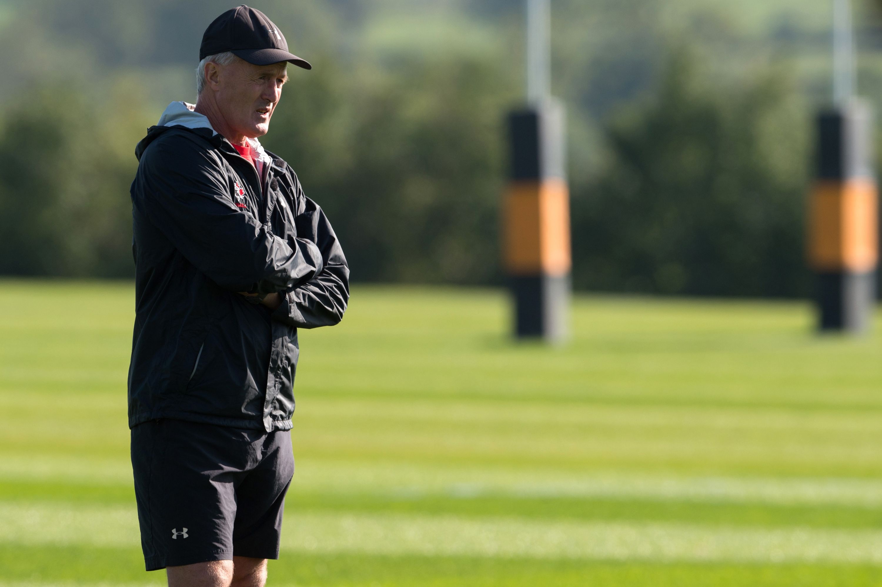 Canada's New Zealander coach Kieran Crowley looks at his players during a team training session at Leicester Grammar School in Leicester on September 28, 2015, during the 2015 Rugby Union World Cup. AFP PHOTO / BERTRAND LANGLOIS RESTRICTED TO EDITORIAL USE (Photo credit should read BERTRAND LANGLOIS/AFP/Getty Images)