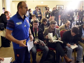 France's head coach Philippe Saint-Andre arrives to give a press conference at the Selsdon Park hotel and Golf club in Croydon, south of London, on September 29, 2015 during the Rugby World Cup