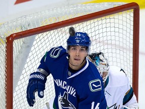 Alex Burrows, and a puck, and a net in the back there. The Canucks didn't manage to connect the two in a dismal 4-0 pre-season loss to the San Jose Sharks Tuesday night. (Darryl Dyck, CP)