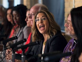 Naomi Klein, author and activist, joins other actors, activists and musicians in launching the Leap Manifesto, outlining a climate and economic vision for Canada during a press conference in Toronto on Tuesday, Sept.  15, 2015. (THE CANADIAN PRESS FILES)