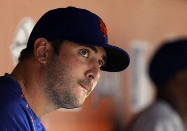 New York Mets pitcher Matt Harvey watches play from the dugout in the eighth inning of a baseball game against the Miami Marlins in Miami, Saturday, Sept. 5, 2015. (AP Photo/Joe Skipper)