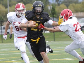 Parker Simson (centre) of the Kelowna Owls could well play both football and basketball at the university level. (Photo --Lorne White/KelownaNow.com)