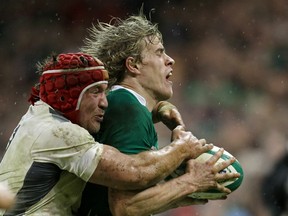 Andrew Trimble, Ireland's 2014 player of the year, won't be at the 2015 Rugby World Cup. (ADRIAN DENNIS/AFP/Getty Images)