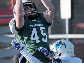 Colton Zayshley hauls in a rare pass during Tweedsmuir's opening-round playoff victory over Belmont last November. (PNG file photo)