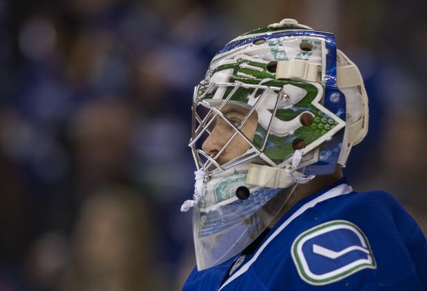 VANCOUVER. October 10 2015. Vancouver Canucks goalie Richard Bachman warms up prior to the Canucks playing the Calgary Flames in the first period of a regular season NHL hockey game at Rogers arena Vancouver October 10 2015. The game was the 2015/2016 home opener for the Canucks. Gerry Kahrmann / PNG staff photo) ( For Prov / Sun Sports ) 00039484A [PNG Merlin Archive]