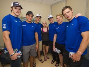 A year after this photo was taken at B.C. Children's Hospital with patient Olivia, three of these six wannabe Canucks are now actual Canucks — and the other three might not be that far behind. From left: Thatcher Demko, Bo Horvat, Jake Virtanen, Jared McCann, Hunter Shinkaruk and Brendan Gaunce.