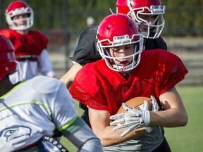 From left offensive guard back to his home at running back, Mouat's Dion Pellerin has always put his team first. (PNG photo, Ric Ernst)