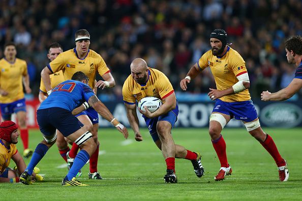 LONDON, ENGLAND - SEPTEMBER 23: Horatiu Pungea of Romania takes on Damien Chouly of France during the 2015 Rugby World Cup Pool D match between France and Romania at the Olympic Stadium on September 23, 2015 in London, United Kingdom.  (Photo by Harry Engels/Getty Images)