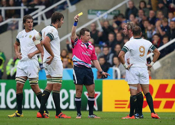 NEWCASTLE UPON TYNE, ENGLAND - OCTOBER 03:  Referee Nigel Owens shows Jannie Du Plessis of South Africa a yellow card during the 2015 Rugby World Cup Pool B match between South Africa and Scotland at St James' Park on October 3, 2015 in Newcastle upon Tyne, United Kingdom.  (Photo by Jan Kruger/Getty Images)
