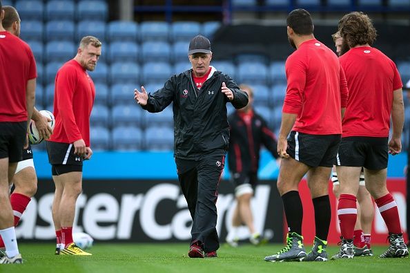 Canada's New Zealander coach Kieran Crowley (C) gestures during a captain's run training session in Leicester, central England, on October 5, 2015, on the eve of their 2015 Rugby Union World Cup match against Romania. AFP PHOTO / BERTRAND LANGLOIS RESTRICTED TO EDITORIAL USE        (BERTRAND LANGLOIS/AFP/Getty Images)
