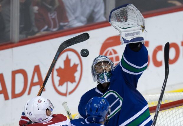 Ryan Miller has played all nine games so far this season for the Canucks. THE CANADIAN PRESS/Darryl Dyck
