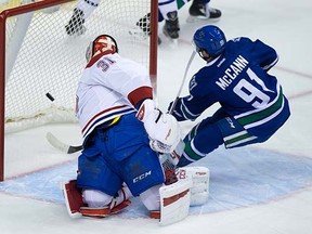 Jared McCann puts one past Carey Price on Tuesday night at Rogers Arena.