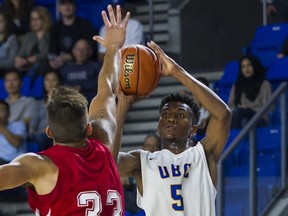 UBC Thunderbirds' rookie guard Taylor Browne measures up a three-pointer Sunday in the team's matinee win over the Newfoundland's Memorial Sea Hawks at the Doug Mitchell Arena. (Richard Lam/UBC athletics)