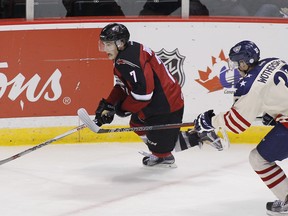 Ty Ronning continues to elude opponents for the Vancouver Giants this season. (Photo by Ben Nelms/Getty Images)