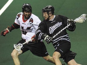 Matt Beers chases after Edmonton's Mark Matthews during Beers' previous stint with the Vancouver Stealth. He's back with the NLL club after a year off. (Province Files.)