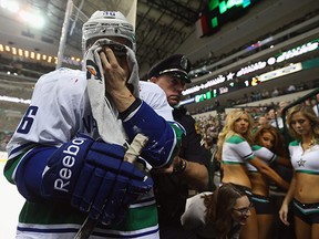 Jannik, it's ok, you're with the Sedins now.  (Photo by Ronald Martinez/Getty Images)