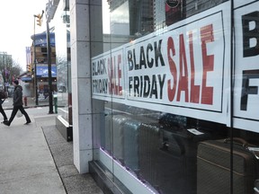 Shoppers on Robson Street on Black Friday 2014 in Vancouver