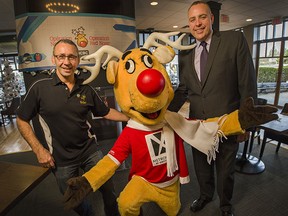 Chris Wilson, Rudolph and Global anchor Steve Darling help launch Operation Red Nose in Coquitlam on Wednesday. The annual holiday ride service helps people enjoy the Christmas season without having to drive drunk as well as raising funds for local charities.