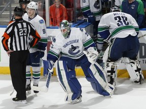 The Canucks have picked Ryan Miller to be their No. 1 goalie to start this season. — The Associated Press files